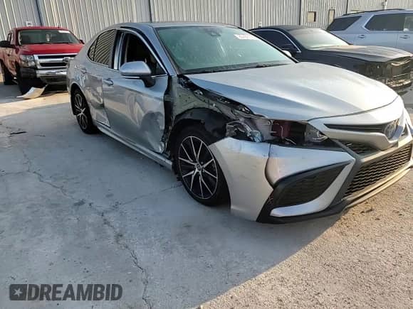 2021 Toyota Camry Hybrid SE с VIN 4T1S31AK2MU563275, выставлен на аукционе Copart как лот 80789115 с пробегом 133 191 миль миль и На запчасти • Non repairable. История ставок и продаж доступна на DreamBid. Изображение 14.