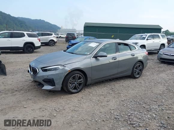 ✅ 2023 BMW 2 Series 228i xDrive • VIN: WBA73AK01P7L83874 • Lot: 42705294. Listed on IAAI with 7,448 mi. Free auction sales archive from the USA and detailed vehicle history report at DreamBid. Image 2.