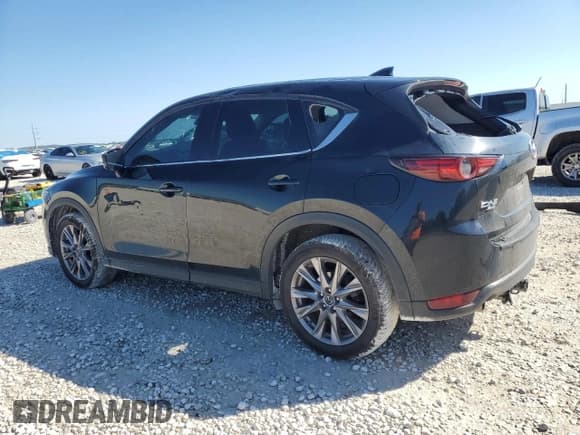 ✅ 2019 Mazda CX-5 Grand Touring • VIN: JM3KFBDM7K0563198 • Лот: 54723494. Опубликован ранее на Copart с пробегом 132 126 миль. Бесплатный доступ к архиву аукционных продаж из США и подробный отчёт об истории автомобиля на DreamBid. Изображение 2.