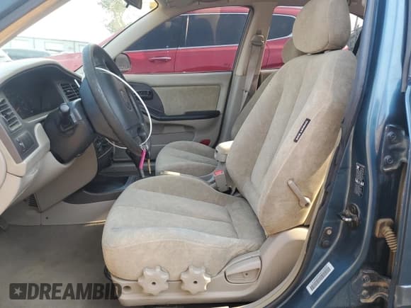 ✅ 2002 Hyundai Elantra GLS • VIN: KMHDN45D42U392655 • Lot: 63441985. Wystawiony na Copart z przebiegiem 146 738 mil. Bezpłatny archiwum sprzedaży aukcyjnych z USA i szczegółowy raport historii pojazdu na DreamBid. Zdjęcie 7.