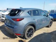 ✅ 2021 Mazda CX-5 Touring • VIN: JM3KFACM9M0424799 • Lot: 42691378. Listed on IAAI with 24,613 mi. Free auction sales archive from the USA and detailed vehicle history report at DreamBid. Image 4.