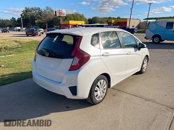 ✅ 2016 Honda Fit LX • VIN: JHMGK5H5XGX018043 • Лот: 90730195. Опубликован ранее на Copart с пробегом 53 727 миль. Бесплатный доступ к архиву аукционных продаж из США и подробный отчёт об истории автомобиля на DreamBid. Изображение 4.