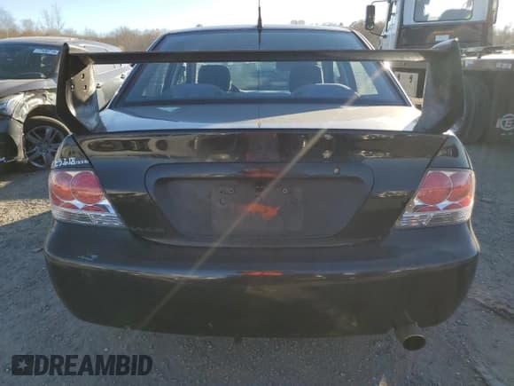 ✅ 2006 Mitsubishi Lancer OZ-Rally • VIN: JA3AJ86E16U059013 • Lot: 80056014. Wystawiony na Copart z przebiegiem 107 179 mil. Bezpłatny archiwum sprzedaży aukcyjnych z USA i szczegółowy raport historii pojazdu na DreamBid. Zdjęcie 6.