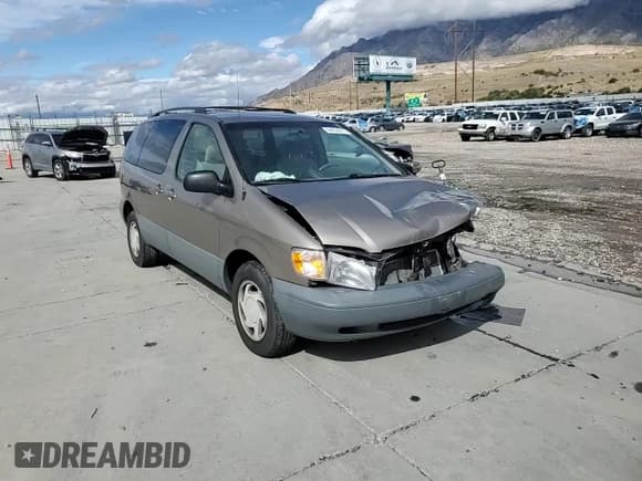 ✅ 1999 Toyota Sienna LE • VIN: 4T3ZF13C2XU134628 • Лот: 84294315. Опубликован ранее на Copart с пробегом 211 607 миль. Бесплатный доступ к архиву аукционных продаж из США и подробный отчёт об истории автомобиля на DreamBid. Изображение 14.