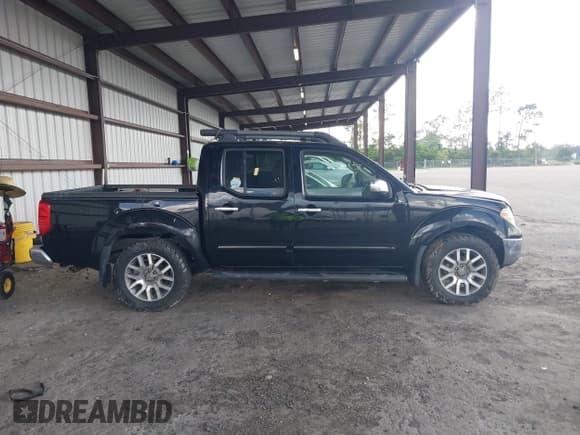 ✅ 2012 Nissan Frontier Pro-4X • VIN: 1N6AD0EV9CC474476 • Lot: 42776914. Listed on IAAI with 174,312 mi. Free auction sales archive from the USA and detailed vehicle history report at DreamBid. Image 12.