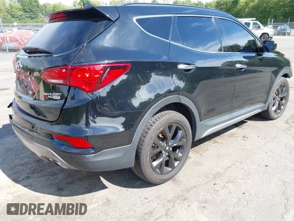 ✅ 2018 Hyundai Santa Fe Ultimate • VIN: 5XYZWDLA7JG508365 • Lot: 42994413. Listed on IAAI with 59,596 mi. Free auction sales archive from the USA and detailed vehicle history report at DreamBid. Image 4.