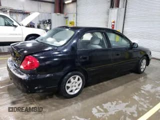 ✅ 2003 Kia Spectra • VIN: KNAFB121435301164 • Лот: 51468115. Опубликован ранее на Copart с пробегом 126 361 миль. Бесплатный доступ к архиву аукционных продаж из США и подробный отчёт об истории автомобиля на DreamBid. Изображение 3.