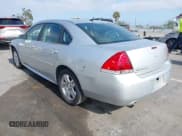 ✅ 2014 Chevrolet Impala LT • VIN: 2G1WB5E31E1100066 • Lot: 42240075. Listed on IAAI with 175,209 mi. Free auction sales archive from the USA and detailed vehicle history report at DreamBid. Image 3.