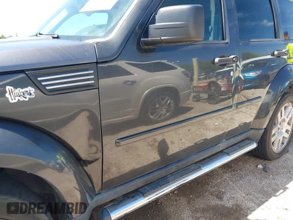 ✅ 2011 Dodge Nitro Heat • VIN: 1D4PU4GX9BW506698 • Lot: 42690394. Listed on IAAI with 159,687 mi. Free auction sales archive from the USA and detailed vehicle history report at DreamBid. Image 6.