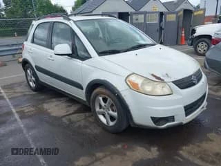 ✅ 2007 Suzuki SX4 • VIN: JS2YB413975105927 • Lot: 42136696. Listed on IAAI with 232,480 mi. Free auction sales archive from the USA and detailed vehicle history report at DreamBid. Image 1.