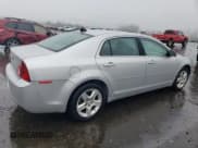 ✅ 2012 Chevrolet Malibu 1LS • VIN: 1G1ZB5E0XCF228055 • Lot: 82209343. Listed on Copart with 105,148 mi. Free auction sales archive from the USA and detailed vehicle history report at DreamBid. Image 3.