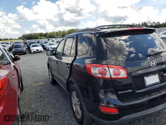 ✅ 2012 Hyundai Santa Fe Limited • VIN: 5XYZK3AB1CG131231 • Lot: 74253504. Listed on Copart with Not provided. Free auction sales archive from the USA and detailed vehicle history report at DreamBid. Image 2.