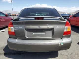 2001 Hyundai Accent GL with VIN KMHCG45C91U186811, listed as a Copart auction lot 56210515 with 79,730 mi miles and Salvage title. Bid and sale history available at DreamBid. Image 6.