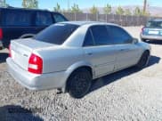 ✅ 2001 Mazda Protege LX • VIN: JM1BJ226910401437 • Lot: 43548017. Wystawiony na IAAI z przebiegiem 236 866 mil. Bezpłatny archiwum sprzedaży aukcyjnych z USA i szczegółowy raport historii pojazdu na DreamBid. Zdjęcie 4.