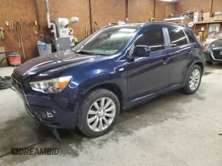 2011 Mitsubishi Outlander SE with VIN JA4AR4AUXBZ013334, listed as a Copart auction lot 71132515 with 173,635 mi miles and Salvage title. Bid and sale history available at DreamBid. Image 1.