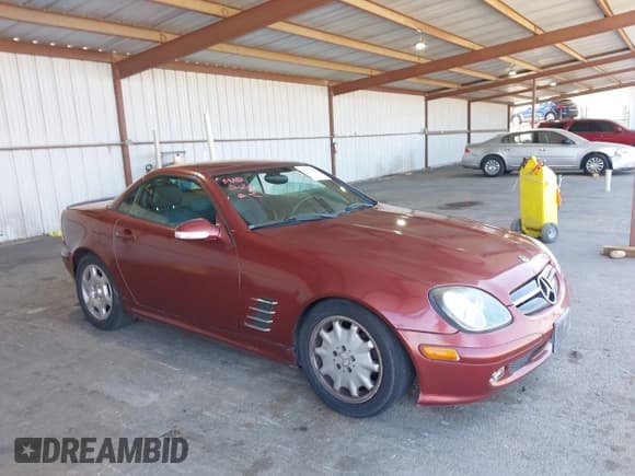 ✅ 2002 Mercedes-Benz SLK 230 Kompressor • VIN: WDBKK49F32F252115 • Lot: 42353986. Listed on IAAI with 192,789 mi. Free auction sales archive from the USA and detailed vehicle history report at DreamBid. Image 1.