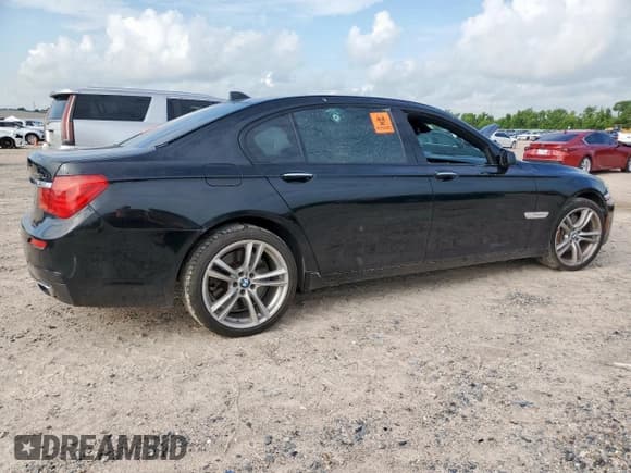 ✅ 2011 BMW 7 Series 750Li • VIN: WBAKB8C5XBCY64741 • Лот: 63798285. Опубликован ранее на Copart с пробегом 100 850 миль. Бесплатный доступ к архиву аукционных продаж из США и подробный отчёт об истории автомобиля на DreamBid. Изображение 3.
