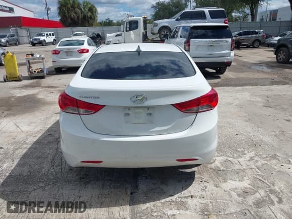 ✅ 2013 Hyundai Elantra GLS • VIN: 5NPDH4AE3DH352008 • Лот: 43484878. Опубликован ранее на IAAI с пробегом 207 568 миль. Бесплатный доступ к архиву аукционных продаж из США и подробный отчёт об истории автомобиля на DreamBid. Изображение 16.