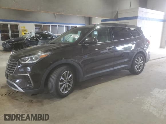 ✅ 2017 Hyundai Santa Fe SE • VIN: KM8SMDHF5HU217105 • Lot: 81822215. Listed on Copart with 118,935 mi. Free auction sales archive from the USA and detailed vehicle history report at DreamBid. Image 1.