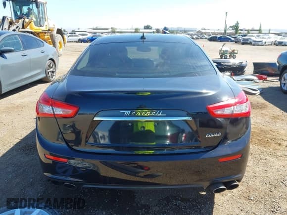 ✅ 2014 Maserati Ghibli • VIN: ZAM57XSA6E1087545 • Lot: 43185040. Listed on IAAI with 79,498 mi. Free auction sales archive from the USA and detailed vehicle history report at DreamBid. Image 16.