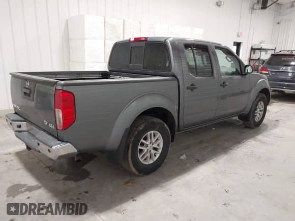2020 Nissan Frontier SV with VIN 1N6ED0EB2LN712289, listed as a IAAI auction lot 41282636 with 67,976 mi miles and . Bid and sale history available at DreamBid. Image 4.