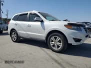 ✅ 2012 Hyundai Santa Fe Limited • VIN: 5XYZK4AG0CG144702 • Lot: 75204044. Listed on Copart with 173,296 mi. Free auction sales archive from the USA and detailed vehicle history report at DreamBid. Image 4.