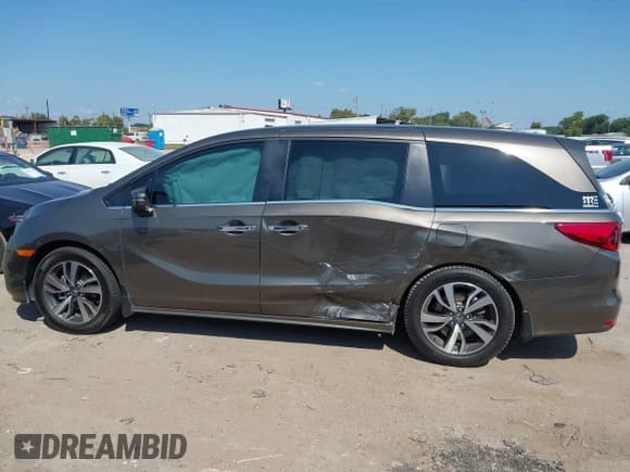 ✅ 2023 Honda Odyssey Touring • VIN: 5FNRL6H85PB034832 • Lot: 43372970. Listed on IAAI with 43,980 mi. Free auction sales archive from the USA and detailed vehicle history report at DreamBid. Image 13.