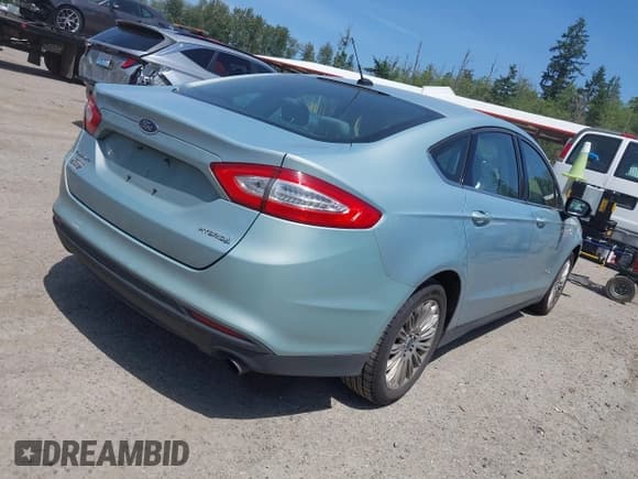 ✅ 2014 Ford Fusion S Hybrid • VIN: 3FA6P0UU3ER220717 • Lot: 42495849. Wystawiony na IAAI z przebiegiem 148 208 mil. Bezpłatny archiwum sprzedaży aukcyjnych z USA i szczegółowy raport historii pojazdu na DreamBid. Zdjęcie 4.