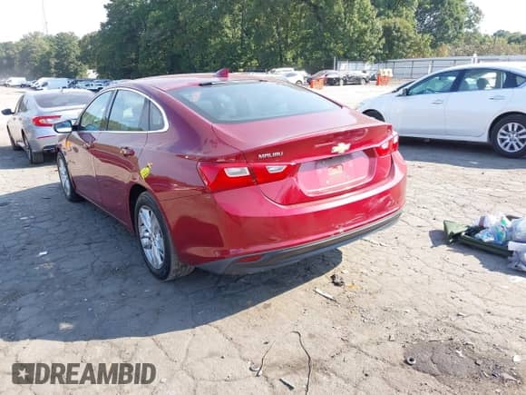 2018 Chevrolet Malibu LT z VIN 1G1ZD5ST9JF187469, wystawiony jako IAAI lot #43236407 z przebiegiem 228 997 mil mil oraz . Historia ofert i sprzedaży dostępna na DreamBid. Obrazek 3.