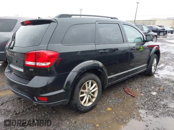 ✅ 2012 Dodge Journey SXT • VIN: 3C4PDCBG5CT341304 • Lot: 43685202. Listed on IAAI with 102,031 mi. Free auction sales archive from the USA and detailed vehicle history report at DreamBid. Image 4.