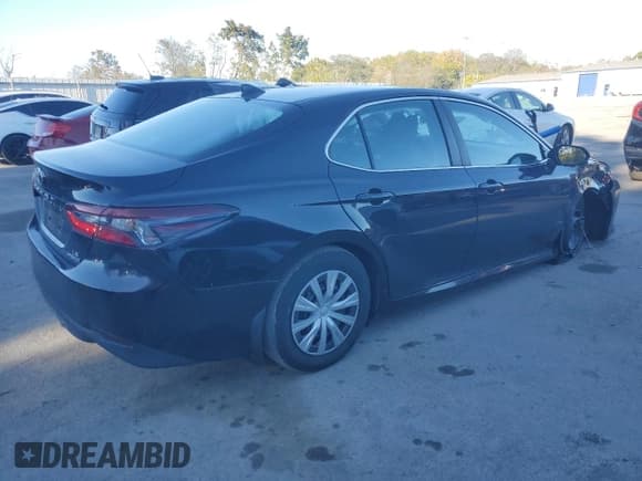 ✅ 2023 Toyota Camry Hybrid LE • VIN: 4T1C31AK1PU601829 • Лот: 87092685. Опубликован ранее на Copart с пробегом 32 187 миль. Бесплатный доступ к архиву аукционных продаж из США и подробный отчёт об истории автомобиля на DreamBid. Изображение 3.