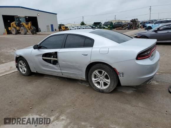 2022 Dodge Charger SXT with VIN 2C3CDXBG0NH197084, listed as a Copart auction lot 71043965 with 89,187 mi miles and Salvage title. Bid and sale history available at DreamBid. Image 2.
