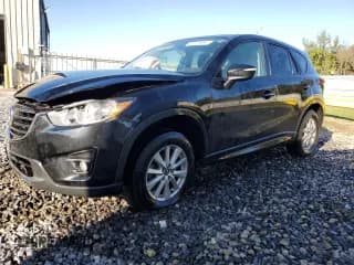 ✅ 2016 Mazda CX-5 Touring • VIN: JM3KE4CY0G0690904 • Lot: 90806355. Wystawiony na Copart z przebiegiem 80 020 mil. Bezpłatny archiwum sprzedaży aukcyjnych z USA i szczegółowy raport historii pojazdu na DreamBid. Zdjęcie 1.
