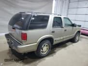 ✅ 2001 Chevrolet Blazer LT • VIN: 1GNDT13W81K253594 • Lot: 63320625. Wystawiony na Copart z przebiegiem Nie podano. Bezpłatny archiwum sprzedaży aukcyjnych z USA i szczegółowy raport historii pojazdu na DreamBid. Zdjęcie 3.