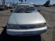 ✅ 1995 Nissan Sentra E • VIN: 1N4AB41D7SC749134 • Lot: 80114815. Wystawiony na Copart z przebiegiem 139 619 mil. Bezpłatny archiwum sprzedaży aukcyjnych z USA i szczegółowy raport historii pojazdu na DreamBid. Zdjęcie 5.