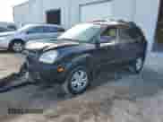 2007 Hyundai Tucson SE z VIN KM8JN72DX7U669440, wystawiony jako Copart lot #82652124 z przebiegiem 146 407 mil mil oraz Szkoda całkowita • Salvage title. Historia ofert i sprzedaży dostępna na DreamBid. Obrazek 1.