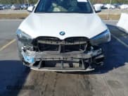 ✅ 2018 BMW X1 xDrive28i • VIN: WBXHT3C38J3H30018 • Lot: 43694942. Listed on IAAI with 50,899 mi. Free auction sales archive from the USA and detailed vehicle history report at DreamBid. Image 12.