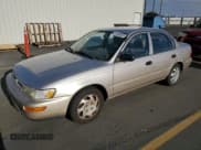✅ 1997 Toyota Corolla CE • VIN: 1NXBA02E1VZ615974 • Лот: 91408555. Опубликован ранее на Copart с пробегом 223 249 миль. Бесплатный доступ к архиву аукционных продаж из США и подробный отчёт об истории автомобиля на DreamBid. Изображение 1.