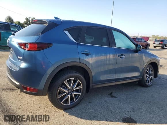 ✅ 2018 Mazda CX-5 Touring • VIN: JM3KFBCM2J0346402 • Lot: 90714345. Wystawiony na Copart z przebiegiem 56 245 mil. Bezpłatny archiwum sprzedaży aukcyjnych z USA i szczegółowy raport historii pojazdu na DreamBid. Zdjęcie 3.