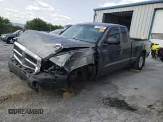 2005 Dodge Dakota SLT с VIN 1D7HW42N05S315223, выставлен на аукционе Copart как лот 71559234 с пробегом 127 204 миль миль и Списание • Salvage title. История ставок и продаж доступна на DreamBid. Изображение 1.