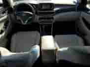 2019 Hyundai Tucson SE z VIN KM8J23A45KU869928, wystawiony jako Copart lot #87183485 z przebiegiem 42 648 mil mil oraz Szkoda całkowita • Salvage title. Historia ofert i sprzedaży dostępna na DreamBid. Obrazek 8.