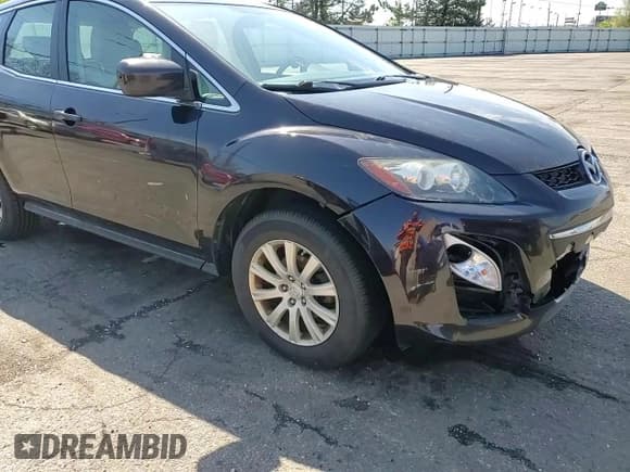 ✅ 2012 Mazda CX-7 i SV • VIN: JM3ER2A59C0420997 • Lot: 52298415. Wystawiony na Copart z przebiegiem 188 327 mil. Bezpłatny archiwum sprzedaży aukcyjnych z USA i szczegółowy raport historii pojazdu na DreamBid. Zdjęcie 12.