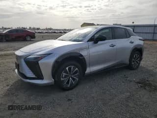 ✅ 2023 Lexus RZ 450e Premium • VIN: JTJAAAAB3PA012264 • Lot: 78655884. Wystawiony na Copart z przebiegiem 9 035 mil. Bezpłatny archiwum sprzedaży aukcyjnych z USA i szczegółowy raport historii pojazdu na DreamBid. Zdjęcie 1.