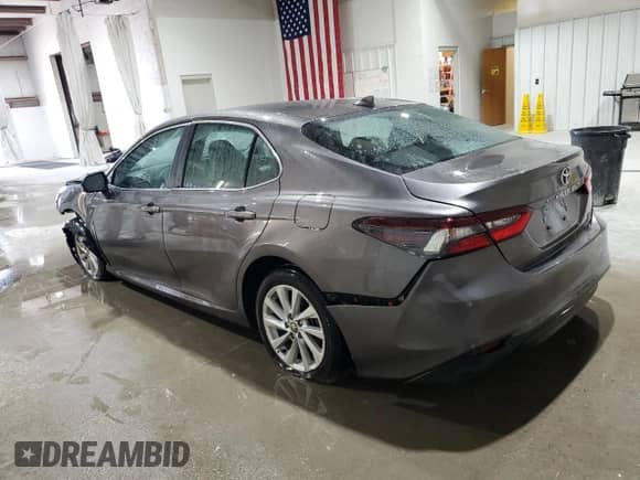 2023 Toyota Camry LE с VIN 4T1C11BK7PU097260, выставлен на аукционе Copart как лот 67957575 с пробегом 21 092 миль миль и Списание • Salvage title. История ставок и продаж доступна на DreamBid. Изображение 2.