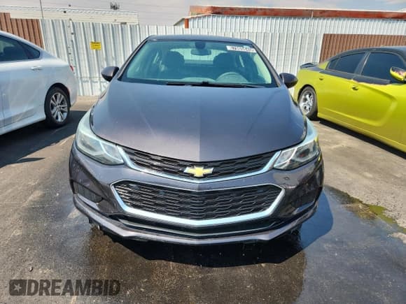 ✅ 2017 Chevrolet Cruze LT • VIN: 1G1BE5SM4H7120242 • Lot: 67965845. Listed on Copart with 137,466 mi. Free auction sales archive from the USA and detailed vehicle history report at DreamBid. Image 5.