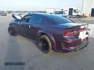 2021 Dodge Charger Scat Pack z VIN 2C3CDXGJ3MH620632, wystawiony jako IAAI lot #43284457 z przebiegiem 60 193 mil mil oraz . Historia ofert i sprzedaży dostępna na DreamBid. Obrazek 3.
