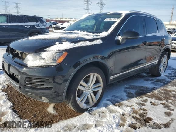 ✅ 2013 Volkswagen Touareg Exec • VIN: WVGEF9BP2DD002295 • Lot: 47942035. Listed on Copart with 146,695 mi. Free auction sales archive from the USA and detailed vehicle history report at DreamBid. Image 1.