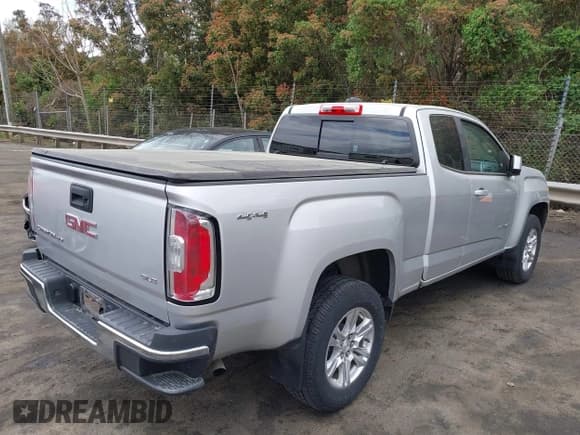 ✅ 2020 GMC Canyon 4WD SLE • VIN: 1GTH6CEN6L1175293 • Лот: 41909988. Опубликован ранее на IAAI с пробегом 13 765 миль. Бесплатный доступ к архиву аукционных продаж из США и подробный отчёт об истории автомобиля на DreamBid. Изображение 4.