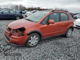 ✅ 2011 Suzuki SX4 Crossover • VIN: JS2YB5A31B6303491 • Lot: 91810955. Wystawiony na Copart z przebiegiem 94 428 mil. Bezpłatny archiwum sprzedaży aukcyjnych z USA i szczegółowy raport historii pojazdu na DreamBid. Zdjęcie 1.