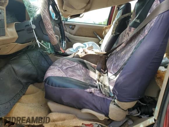 1997 Chevrolet S-10 LS with VIN 1GCDT19X6V8152954, listed as a Copart auction lot 70297885 with 234,442 mi miles and Salvage title. Bid and sale history available at DreamBid. Image 7.